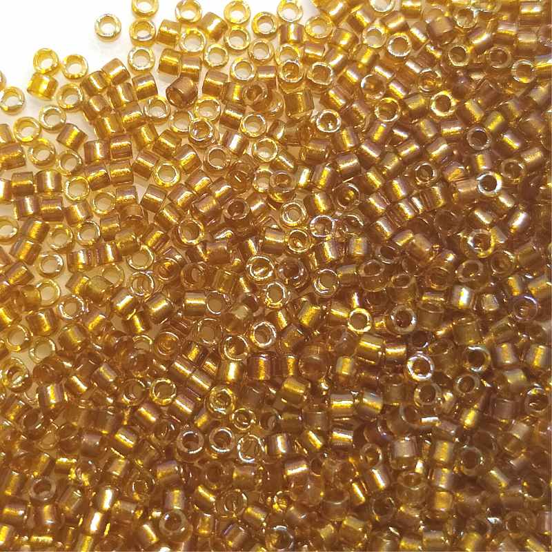 11/0 MIYUKI delica - Crystal Topaz AB lined - DB065 - 1gr. - - Crystaldreams Abalorios