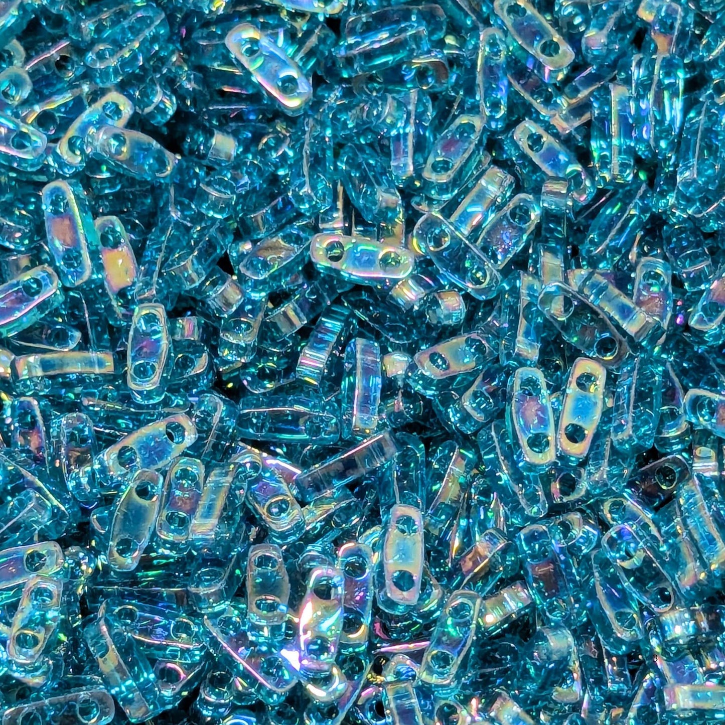 Miyuki Quarter-Tila 5x1,2x1,9mm 1gr. Transparent Teal AB