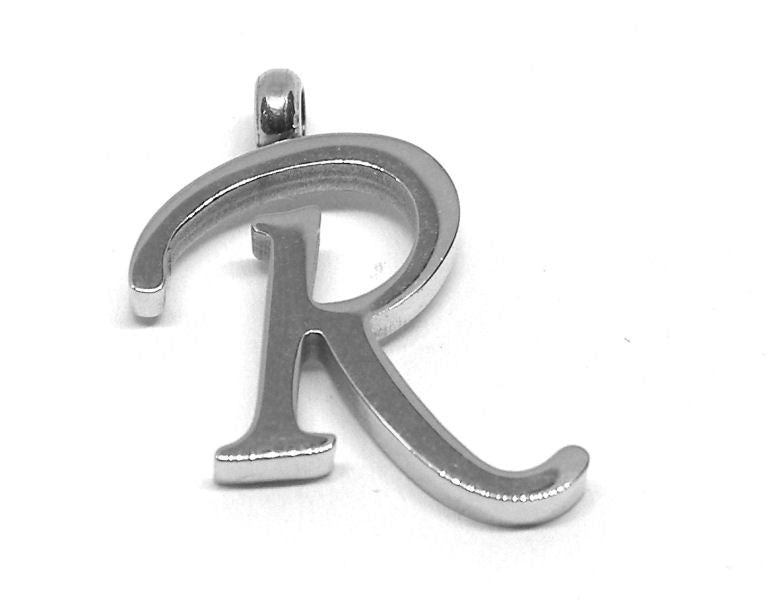 Colgante Letra de acero inox 304 16~19x6~19x2mm Agujero:2mm R - - Crystaldreams Abalorios