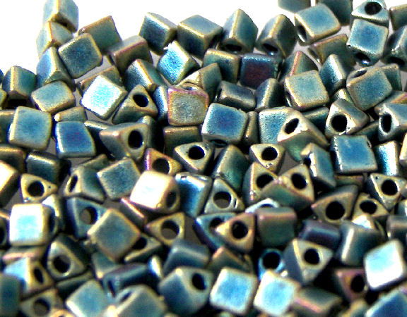 Triangulos Miyuki 10/0 Mat Metal Patina Iris 1 gr. - - Crystaldreams Abalorios