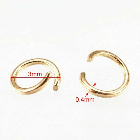 Anillas de salto 3mm x 0.4mm acero inoxidable con chapado oro real 18k