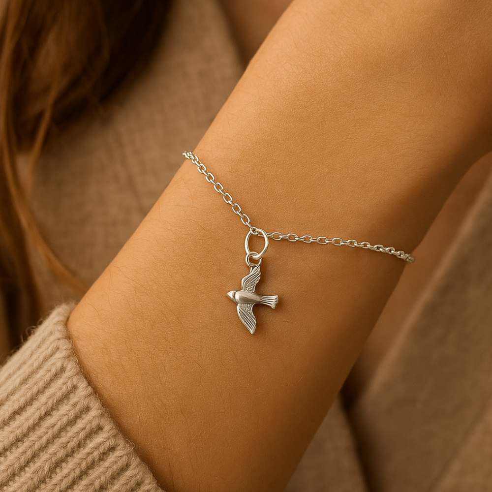 Colgante pájaro en plata de ley con anilla de montaje incluida