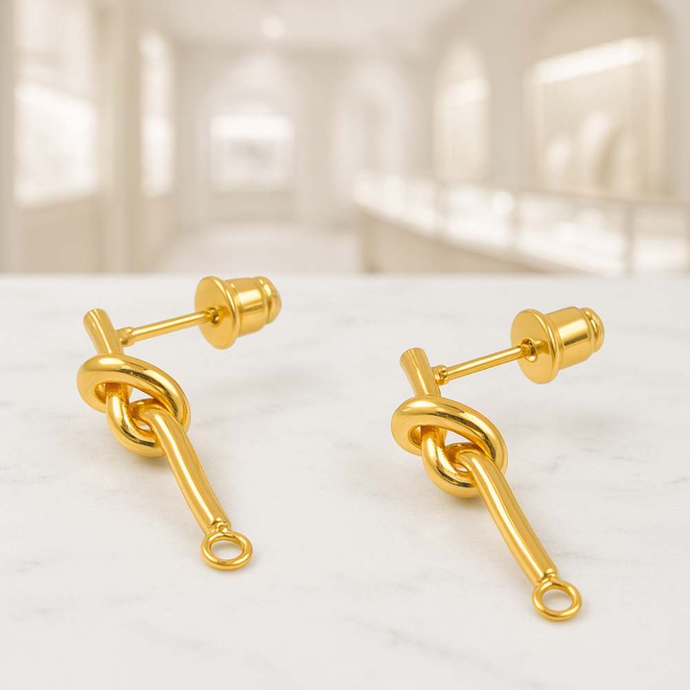 entrepieza pendientes con Nudo en chapado oro real 18K