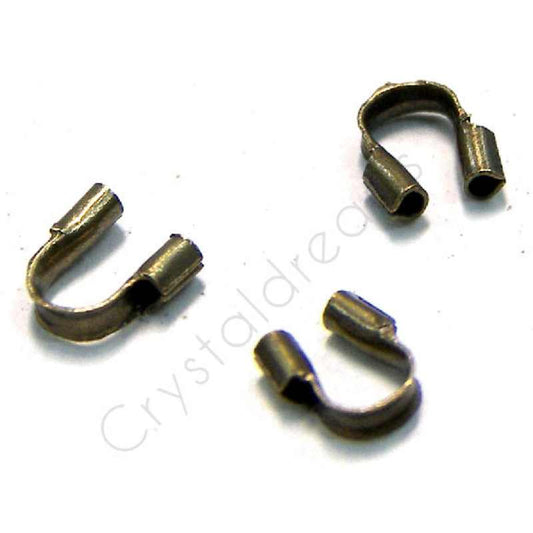 10 x Guardian, Guia para hilos de 4,5x4mm Agujero: 0,5mm Bronze -  - Crystaldreams Abalorios