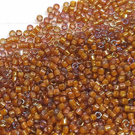 11/0 MIYUKI delica White Lined Dark Topaz AB - DB1779 - 1gr. -  - Crystaldreams Abalorios