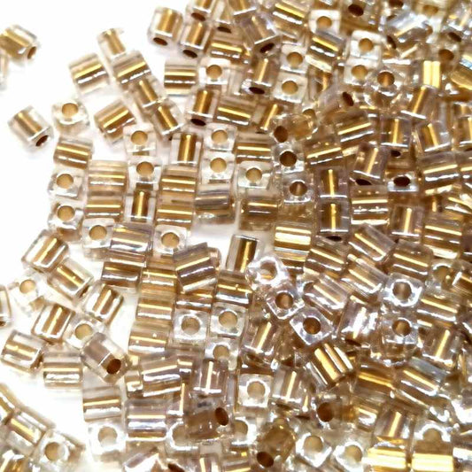 3mm Cubos MIYUKI - 5 gr. pack - Crystal Metallic Gold Lined -  - Crystaldreams Abalorios