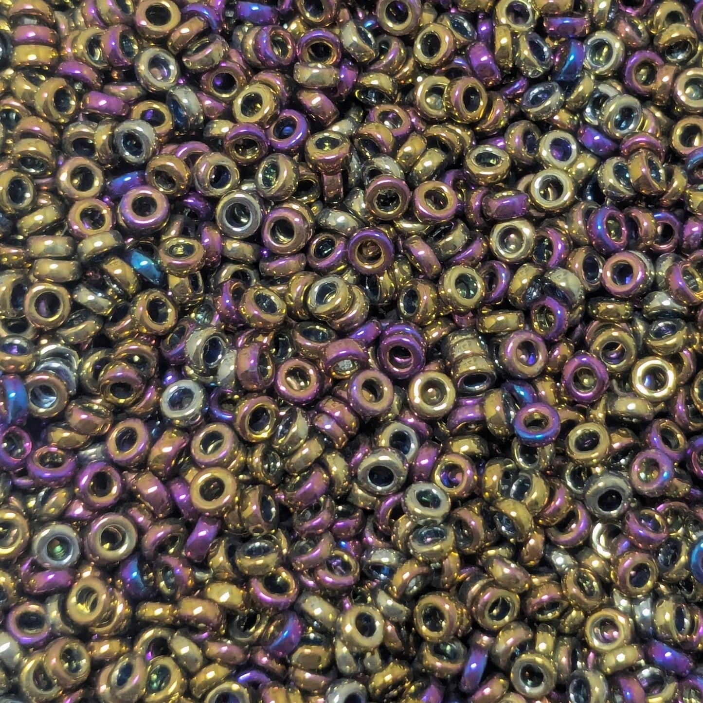 Distanciadores miyuki metallic gold iris