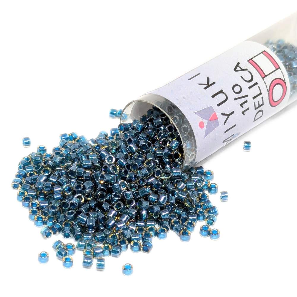 DB0921 Tubo Miyuki Delica 11/0 Sparkling Teal Lined Topaz 7,2gr. -  