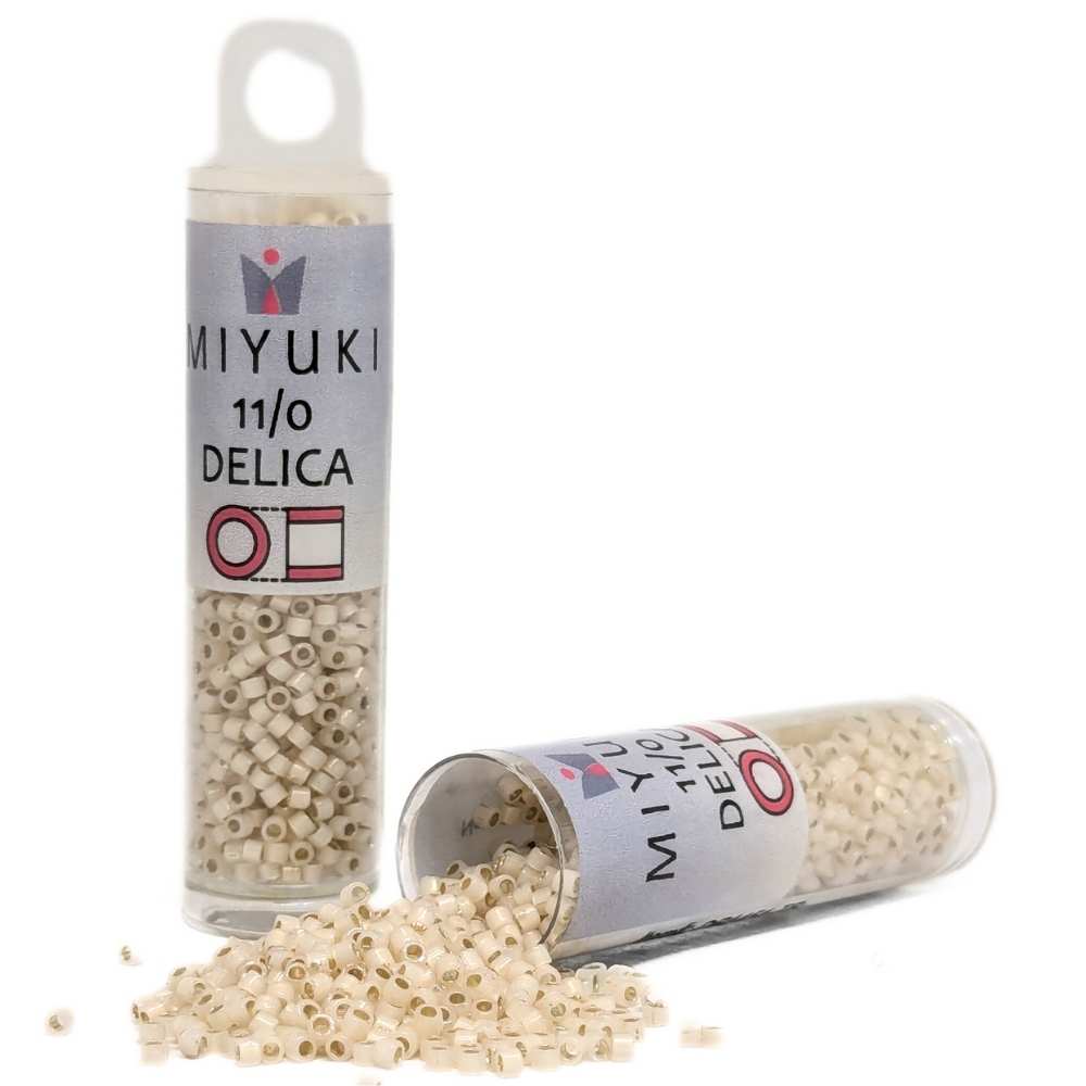 DB1451 Tubo Miyuki Delica 11/0 Silver lined Pale cream Opal 7,2gr. -  