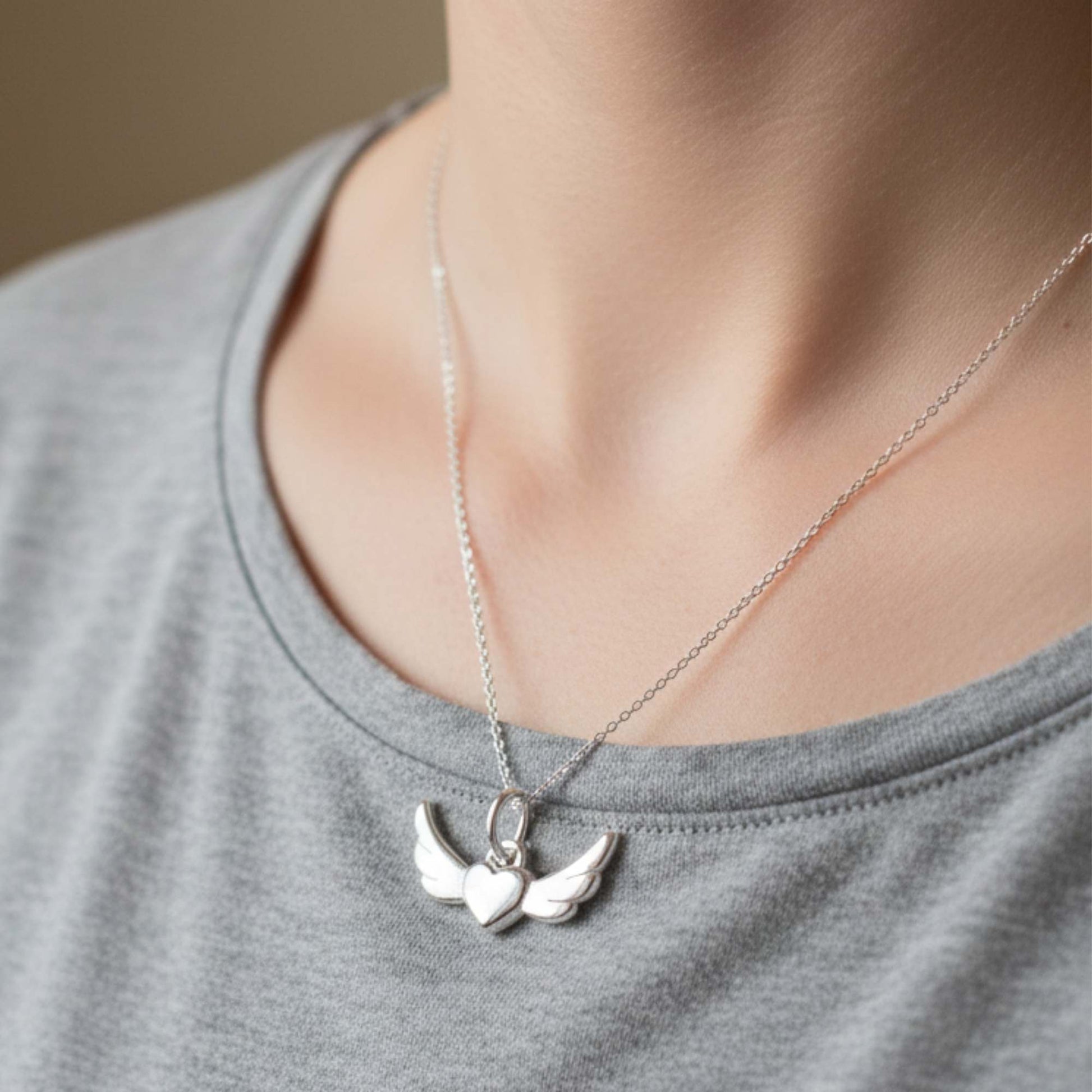 Charm corazón alado de plata 925 para pulseras y collares