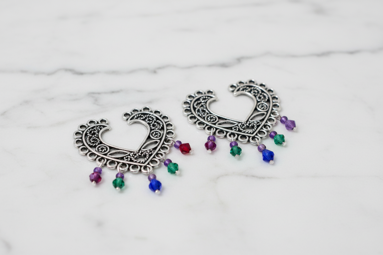 Entrepiezas corazón con diseño chandelier