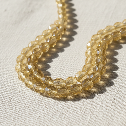 Joyería con cuentas facetadas topacio claro