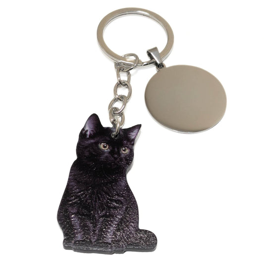 llavero en plastico con gato negro
