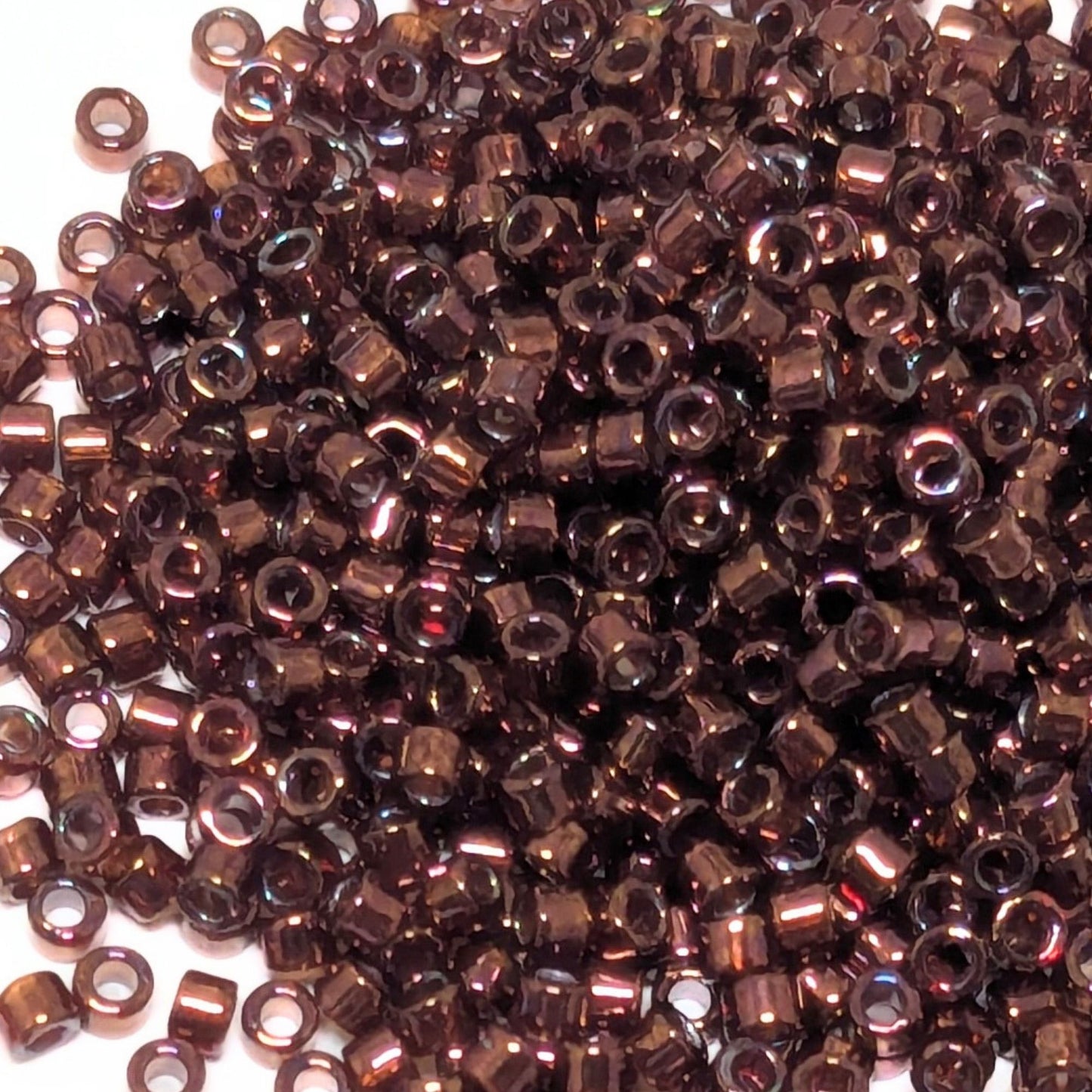 11/0 MIYUKI delica DB0116 - Transp- Luster Red Metallic - 1 gr.