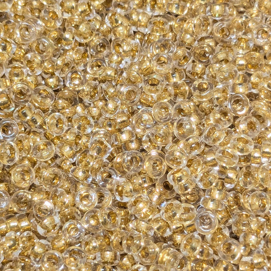 Distanciadores Miyuki 2,2 mm x 1,3 mm 24Kt Gold Lined Crystal - Col. 195