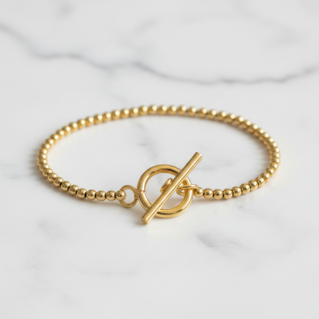 Pulsera con cierre toggle dorado